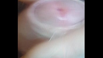A close up jerk with cum shot watched by girlfriend.