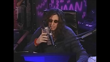 20 year old gives Howard Stern a handjob and licks his toes under the desk